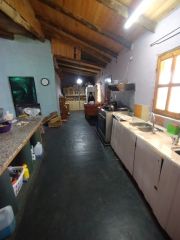 Se vende terreno con casa ubicado a las afueras de Pottier de 2900 m2 . (180.000 uss)